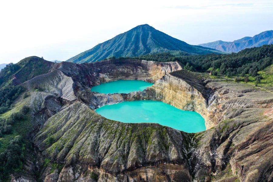 Two of Kelimutu's crater lakes framed by the ridge line