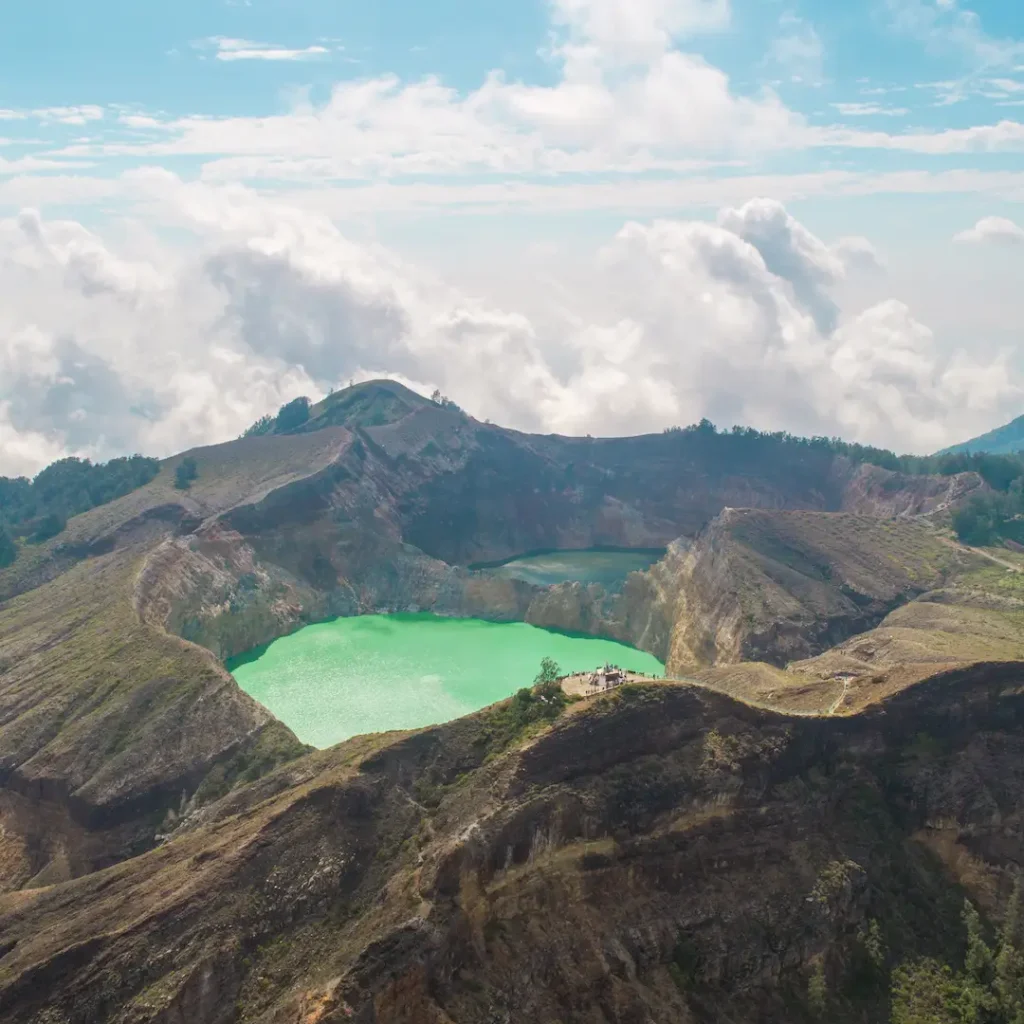 Panoramic view of the tri-colour Kelimutu crater lakes on the rim trail